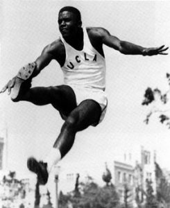 Jackie Robinson does the long jump while he is a student at the University of California at Los Angeles in 1939.