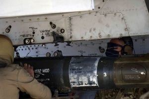 Airmen from the 924th Aircraft Maintenance Unit secure munitions onto an A-10 Thunderbolt II at Davis-Monthan Air Force Base