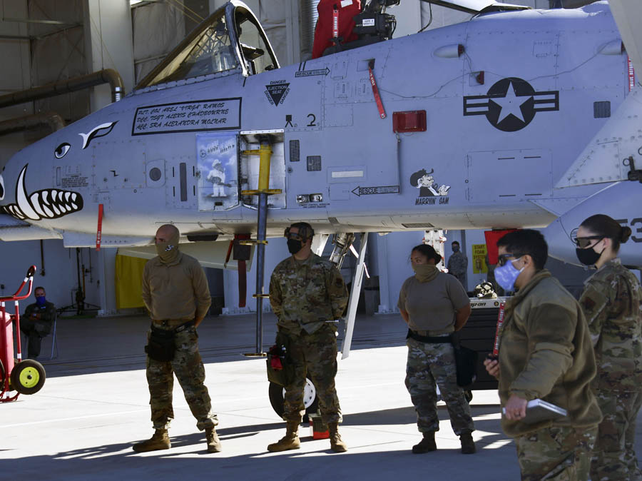 The load crew representing the 924th Aircraft Maintenance Unit stands by an A-10 Thunderbolt II during the 2020 annual load crew competition at Davis-Monthan Air Force Base