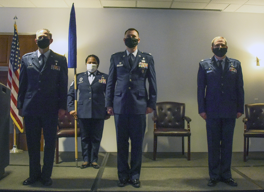 From left, U.S. Air Force Col. Patrick Parsons, 355th Medical Group commander, U.S. Air Force MSgt Chakemia Chambers, 355th Medical Support Squadron superintendent, U.S. Air Force Lt. Col. Joshua Curtis, former 355th Medical Support Squadron commander, and Lt. Col. David Dennison, 355th Healthcare Operations Squadron commander