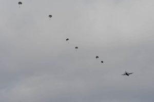 U.S. Air Force Airmen assigned to the 563rd Rescue Group jump from an HC-130J Combat King II over Davis-Monthan Air Force Base