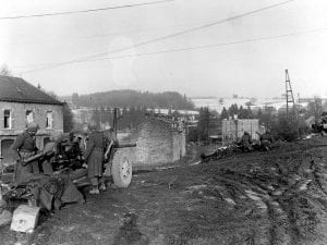 An M5 gun crew in action in France in 1944