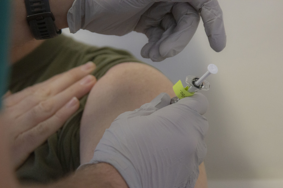 Master Chief Petty Officer Joseph Martin, command master chief of Marine Forces, Special Operations Command, receives the COVID-19 vaccine at Naval Medical Center Camp Lejeune, Jan. 15, 2021. The COVID-19 vaccination plan is phase-driven and designed to safely protect members within the Department of Defense as quickly as possible.