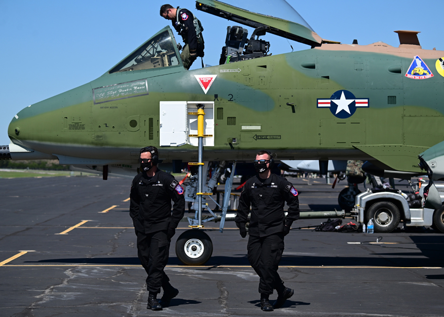 Members of the A-10 Thunderbolt II Demonstration Team carry out a ground performance after an aerial demonstration during the Bluebonnet Airshow