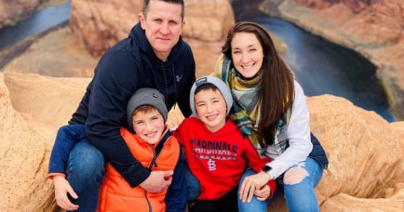 Jayme Killoren and her family pose in front of the Grand Canyon, Ariz.