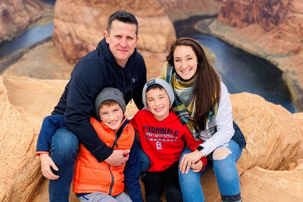 Jayme Killoren and her family pose in front of the Grand Canyon, Ariz.