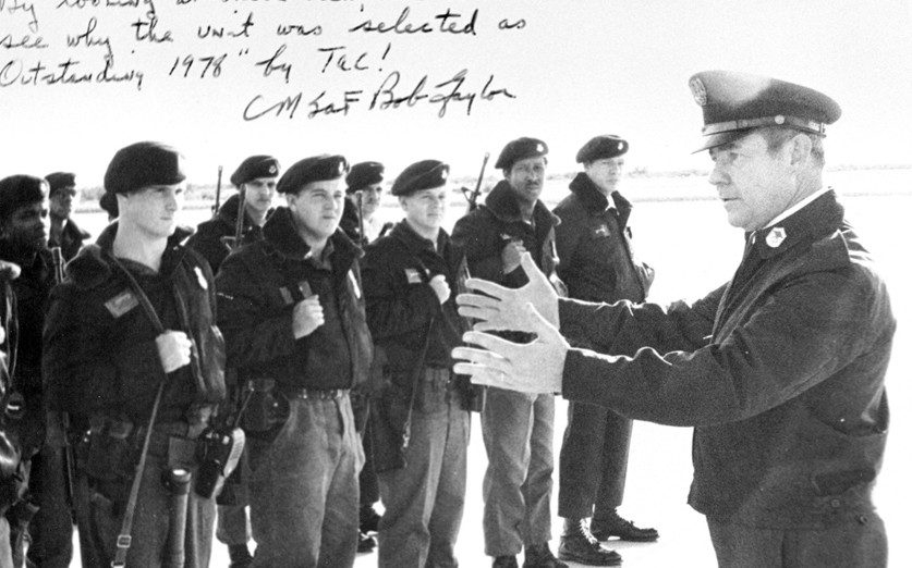 The fifth Chief Master Sergeant of the Air Force, Bob Gaylor, speaks to a group of Airmen during a visit to Davis-Monthan Air Force Base, Arizona, in the 1970s.