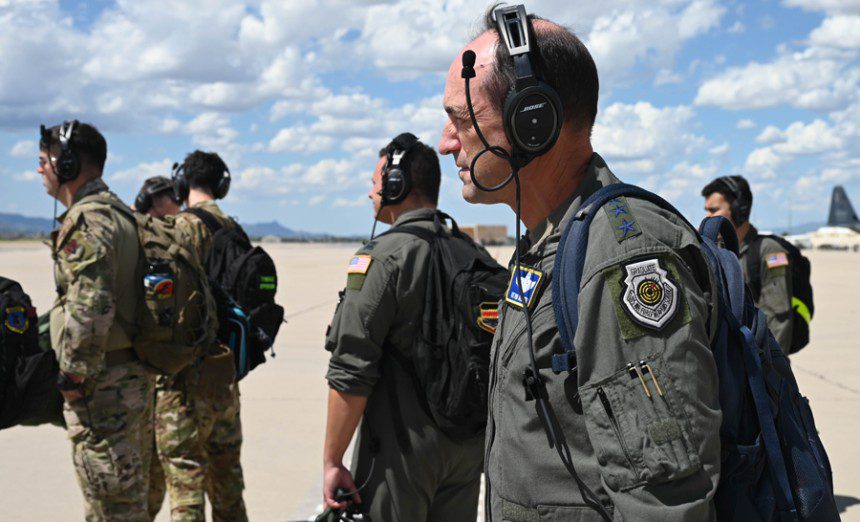 Lt. Gen. Kevin Kennedy, 16th Air Force (Air Forces Cyber) commander, and other Airmen prepare to board an EC-130H Compass Call from the 55th Electronic Combat Group at Davis-Monthan Air Force Base, Ariz., Sept. 14, 2022. The 55th ECG accomplishes the Compass Call mission providing vital capabilities in the realm of electromagnetic warfare for the Air Force. Kennedy is responsible for than 40,000 personnel conducting worldwide operations in cyberspace, Intelligence, Surveillance & Reconnaissance, electromagnetic spectrum, information, public affairs and weather.
