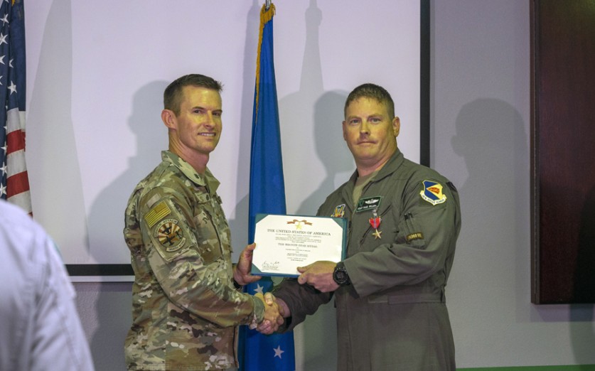 Master Sgt. Paul W. Hiller receives the Bronze Star Medal Sept. 1, 2022, at Nellis Air Force Base, Nevada. Hiller planned and executed the recovery of multiple at-risk Afghan citizens and their families from three different airfield gates at great risk to his own safety. He was personally responsible for delivering more than 100 Afghans to asylum. (U.S. Air Force photo by Airman 1st Class Jordan McCoy)