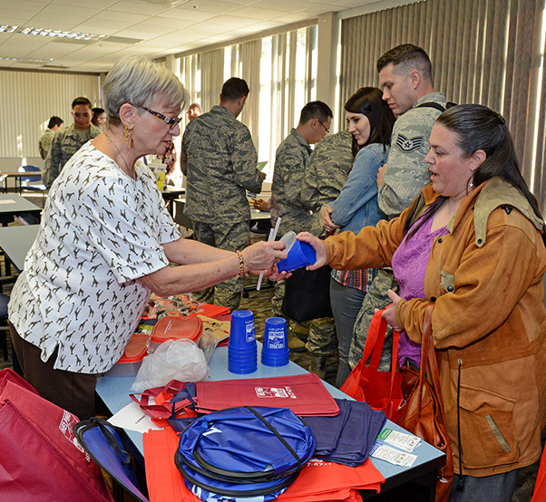 Air Force photograph by Kenji Thuloweit Many participants at the Newcomer’s Orientation Briefing information fair Nov. 2 handed out free gifts as a way to welcome those new to Edwards AFB. The information fair was held in the Airman and Family Readiness Center Looking Glass Room. 