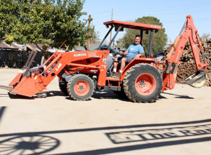 Photograph by Linda KC Reynolds In honor of his mother, Hynes bought a Kubota tractor to help with his wood business at The Ranch, in Lancaster, Calif. Hynes’ strict upbringing prepared him for the military, Boeing and the rewards of hard work.