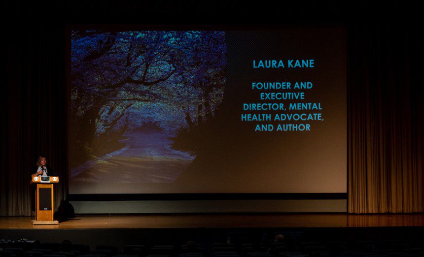 Laura Kane, founder and executive director of Marshmallowís HOPE, speaks to Airmen, civilians and family members during a suicide prevention presentation in the base theater at Edwards Air Force Base Calif., Sept. 1, 2021. (Air Force photograph by Kyle Brasier)