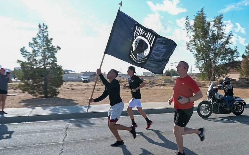 More than 83,000 service members are still missing in action from America's conflicts. To honor those who have sacrificed so much, Edwards Air Force Base, Calif., held a POW/MIA Remembrance Run. (Air Force photograph by Adam Bowles)
