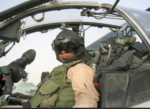 Marine Corps air combat veteran Vernice “FlyGirl” Armour sits in the cockpit of the AH-1W Super Cobra attack helicopter she piloted in the 2003 Iraq invasion. She now lectures on how to persevere in life. (Courtesy photograph)