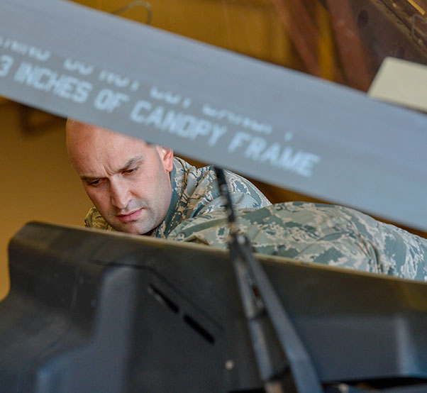 Air Force photograph by Airman 1st Class Caleb Worpel Tech. Sgt. Joseph Scalise, 56th Component Maintenance Squadron egress systems technician, performs safety checks on the canopy of an F-35A Lightning II before the removal of an ejection seat at Luke Air Force Base, Ariz., Jan. 11, 2018. All F-35s and partner nation aircraft at Luke are scheduled to receive new ejection seat modifications in the near future.