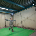 Staff Sgt. Jennifer Oropeza-Magee, 56th Aerospace Medical Squadron flight medical technician, performs movements during a Dynamic Athletic Research Institute assessment at Luke Air Force Base, Ariz., Jan. 26, 2018. The assessment was conducted using the DARI marker-less motion analytics machine, an eight camera system designed to pinpoint weak muscle groups and predict which areas of the body are most prone to injury. Air Force photograph by Airman 1st Class Alexander Cook