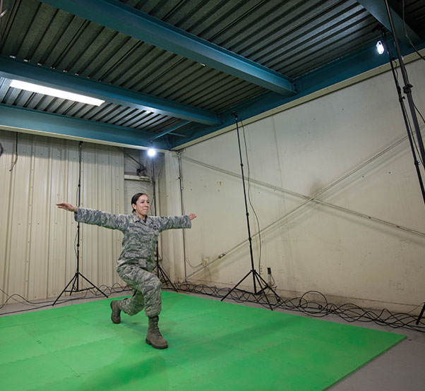 Staff Sgt. Jennifer Oropeza-Magee, 56th Aerospace Medical Squadron flight medical technician, performs movements during a Dynamic Athletic Research Institute assessment at Luke Air Force Base, Ariz., Jan. 26, 2018. The assessment was conducted using the DARI marker-less motion analytics machine, an eight camera system designed to pinpoint weak muscle groups and predict which areas of the body are most prone to injury. Air Force photograph by Airman 1st Class Alexander Cook