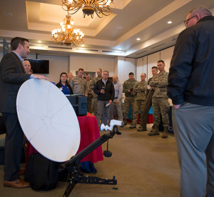 Air Force photograph by Senior Airman Ridge Shan  A technology company representative briefs 56th Fighter Wing leadership on new products during the 2018 Luke Tech Expo at Luke Air Force Base, Ariz., Feb. 22, 2018. The tech expo allowed wing leadership to view mission-centric technology exhibits from approximately 20 industry leaders in fields like telecommunications, cybersecurity, virtual reality and network management.