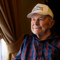 Air Force photograph by Staff Sgt. Jensen Stidham Retired Brig. Gen. Chuck Yeager sits in his wheelchair while visiting Luke Air Force Base, Ariz., Feb. 13, 2018. In 1943, the flying ace graduated flight training and received his wings while stationed at Luke. As part of Yeager’s 95th birthday celebration, he participated in telling stories to Luke Thunderbolts about his Air Force career and time spent at Luke in the 1940s.