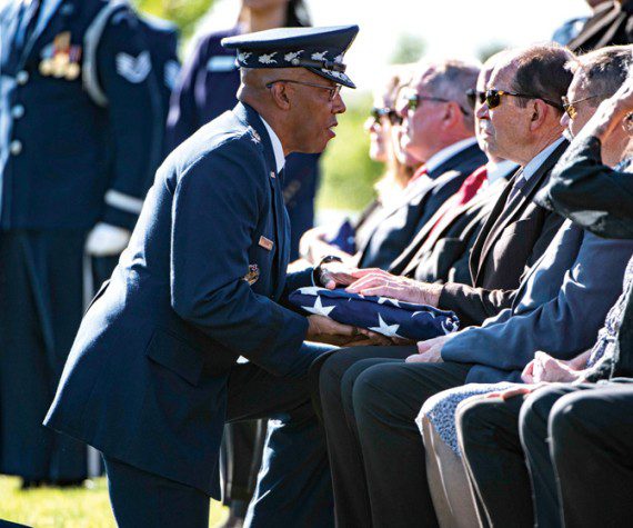 Chief of Staff of the U.S. Air Force Gen. Charles Q. Brown, Jr. presents to U.S. flag to Robert Pattillo following the funeral service for Pattillo' father, Maj. Gen. Cuthbert Pattillo, in Section 75 of Arlington National Cemetery, Arlington, Va., Sept. 14, 2022. Pattillo's twin brother, U.S. Air Force Lt. Gen. Charles Pattillo, was also interred at this time.



Twin brothers, Maj. Gen. and Lt. Gen. Pattillo enlisted in the U.S. Army Air Forces in November 1942. During World War II, both flew with the Eighth Air Force’s 352nd Fighter Group, protecting bombers and attacking ground targets. Maj. Gen. Pattillo flew 135 combat missions before being shot down and captured by the Germans. He remained a POW until the end of the war.



Both were released from active duty following World War II but were later recalled in early 1948, serving with the 31st Fighter Group. Later, both served with the with the 36th Tactical Wing at Furstenfeldbruck Air Base in Germany. While in Europe, both helped form and flew in the U.S. Air Forces in Europe-North Atlantic Treaty Organization aerial demonstration team, the “Skyblazers.”



Later, the brothers went to Luke Air Force Base, Ariz., as gunnery instructors. Together, they were instrumental in forming the “Thunderbirds,” the first U.S. Air Force official aerial demonstration team. Maj. Gen. Pattillo flew right wing and Lt. Gen. Pattillo flew left wing in the original 1953 team.



Both Generals continued their long careers through the Air Force, serving through the Vietnam and Korean Wars. Maj. Gen. Pattillo retired in 1980 and Lt. Gen. Pattillo retired in 1981.



Maj. Gen. Pattillo’s military decorations and awards include the Distinguished Service Medal with oak leaf cluster, Silver Star, Legion of Merit with two oak leaf clusters, Distinguished Flying Cross with oak leaf cluster, Air Medal with 13 oak leaf clusters, Air Force Commendation Medal with oak leaf cluster, Army Commendation Medal, Distinguished Unit Citati