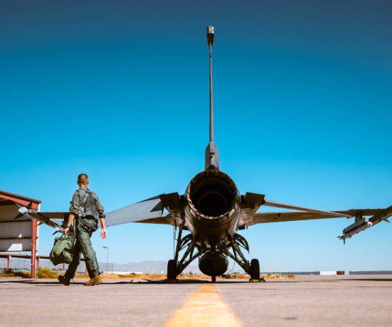 Col. Anthony Mullinax, 56th Mission Support Group commander, climbs into an F-16 Fighting Falcon before his final flight, June 13, 2023, at Luke Air Force Base, Ariz. Fini-flights are conducted in recognition of an Airman’s accomplishments achieved during their time at a unit. (Air Force photograph by Airman 1st Class Mason Hargrove)