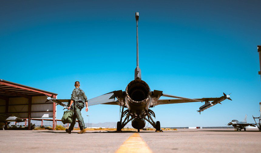 Col. Anthony Mullinax, 56th Mission Support Group commander, climbs into an F-16 Fighting Falcon before his final flight, June 13, 2023, at Luke Air Force Base, Ariz. Fini-flights are conducted in recognition of an Airman’s accomplishments achieved during their time at a unit. (Air Force photograph by Airman 1st Class Mason Hargrove)