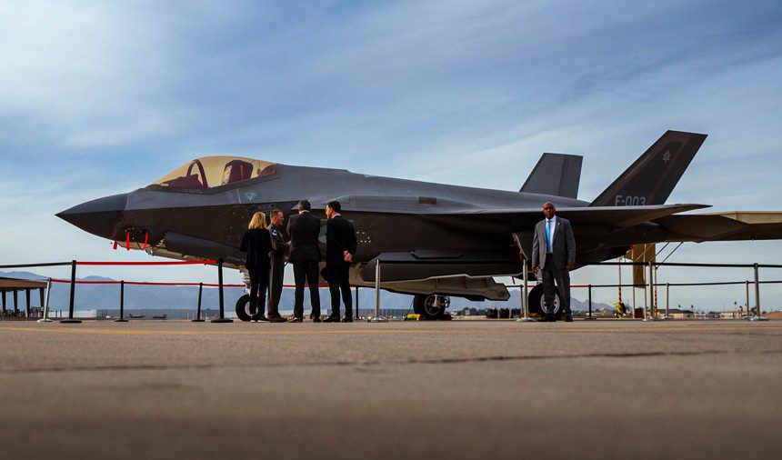 Mark Rutte, Netherlands prime minister (right) and Jan Jambon, Flanders minister-president (middle-right), receive a tour of an F-35 Lightning II assigned to the 56th Fighter Wing. Rutte and Jambon’s visit to Arizona is part of an economic mission to the United States, seeking insights into the advanced aviation technology developed. The tour included discussions on the F-35 Lightning II’s role in bolstering NATO capabilities and its strategic importance in joint training exercises like Desert Vulture. (Air Force photograph by Airman 1st Class Mason Hargrove)