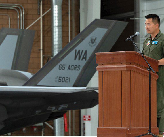 Lt. Col. Brandon Nauta, 65th Aggressor Squadron commander, makes remarks during the activation ceremony for the 65 AGRS at Nellis Air Force Base, Nevada, June 9, 2022. The aggressor squadron s mission is to prepare warfighters to win in air combat against any adversary. (U.S. Air Force photo by Airman 1st Class Josey Blades)