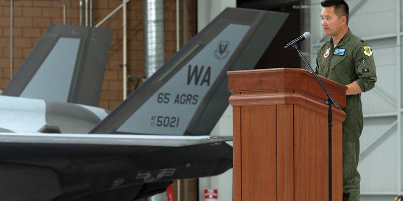 Lt. Col. Brandon Nauta, 65th Aggressor Squadron commander, makes remarks during the activation ceremony for the 65 AGRS at Nellis Air Force Base, Nevada, June 9, 2022. The aggressor squadron s mission is to prepare warfighters to win in air combat against any adversary. (U.S. Air Force photo by Airman 1st Class Josey Blades)