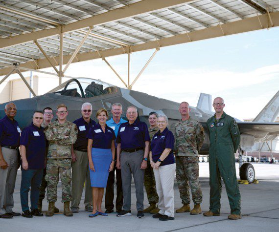 Air and Space Forces Association legends pose for a group photo in front of an F-35 Lightning II assigned to the 422nd Test and Evaluation Squadron during a flight line tour on Nellis Air Force Base, Nevada, July 27, 2022. The AFA mission is to promote dominant U.S. Air and Space Forces as the foundation of a strong National Defense as well as honoring and supporting Airmen, Guardians, and their Families. (U.S. Air Force photo by Airman 1st Class Josey Blades)