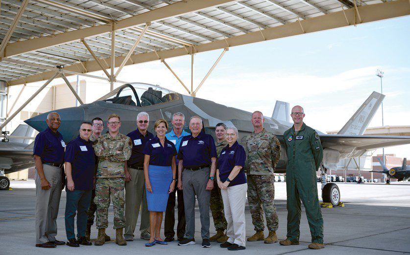 Air and Space Forces Association legends pose for a group photo in front of an F-35 Lightning II assigned to the 422nd Test and Evaluation Squadron during a flight line tour on Nellis Air Force Base, Nevada, July 27, 2022. The AFA mission is to promote dominant U.S. Air and Space Forces as the foundation of a strong National Defense as well as honoring and supporting Airmen, Guardians, and their Families. (U.S. Air Force photo by Airman 1st Class Josey Blades)