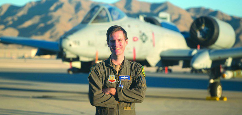 U.S. Air Force Major Kyle Adkison, A-10 Pilot assigned to the 53rd Wing is presented the Distinguished Flying Cross with Combat Service by U.S. Air Force Major General R. Scott Jobe, Director of Plans, Programs, and Requirements, Headquarters Air Combat Command, during a ceremony at Nellis Air Force Base, Nevada, Nov. 22, 2022.