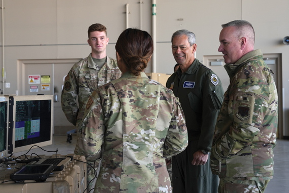 U.S. Air Force Gen. Ken Wilsbach, commander of Air Combat Command, and Chief Master Sgt. David Wolfe, ACC command chief, are shown a portable air control station by Senior Airman Joseph Halsey and Airman 1st Class Anika Manabat, 432nd Aircraft Maintenance Squadron avionics journeymen, at Creech Air Force Base, Nevada, March 4, 2024. Wilsbach and Wolfe saw its role in enhancing the 432nd Wing/432nd Air Expeditionary Wing’s operational agility and responsiveness.