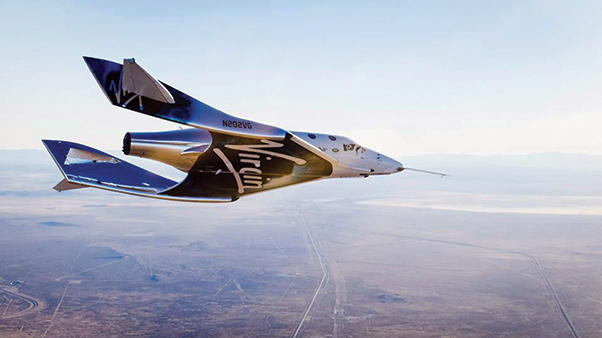 Photograph courtesy of Virgin Galactic Virgin Spaceship Unity glides for the first time after being released from Virgin Mothership Eve above the Mojave Desert Dec. 3.