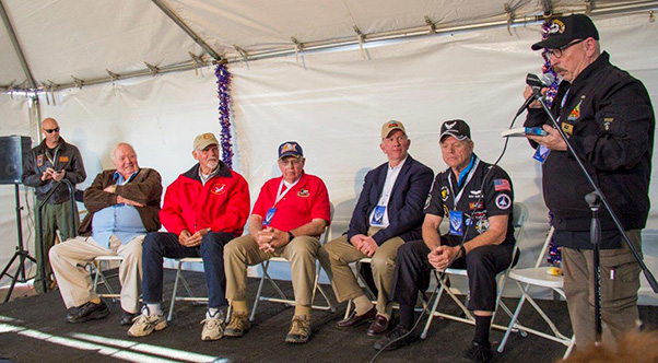 Dennis Anderson, military journalist and author, (far right) moderates ‘Going Downtown — The Air War in Vietnam during a history panel discussion at the Los Angeles County Air Show. The retired U.S. Air Force officers shared intimate and frank stories about the Vietnam War. All five fighter pilots believed the war was lost by political leadership but that the final air campaign secured release of American POWs. Pilots are: Lt. Col. Dick Rutan, Col. Joe Kittinger, Maj. Gen. Doug Pearson, Col. Bob Ettinger and Col. Roy Martin.