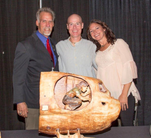 Photo by Linda KC Reynolds Art Thompson of A2Zfx and Sage Cheshire pose with Julie and Nay Schuder in front of an art piece sculpted by Nay during the Gathering of Eagles event. Thompson designed and crafted the center pieces which were then purchased by aerospace enthusiasts and autographed by the new Eagles. Artists Doug Castleman and Mark Pestana also displayed their aerospace art.