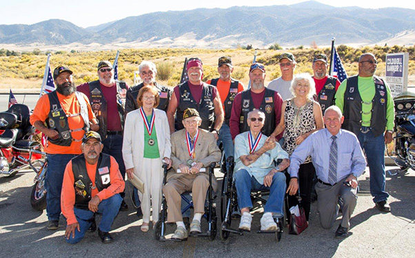 Photograph by Linda KC Reynolds World War II veterans Staff Sgt. John Grenek and Capt. Robert “Bomber Bob” Wood were honored and escorted by the Patriot Guard Oct. 27. They toured Tehachapi and the Municipal Airport, where they viewed a PT-22 Stearman Airplane — the same type of aircraft used to train new pilots in the early 1940s. (Front) Richard Parrea, Jane Grenek, John Grenek, Robert “Bomber Bob” Wood and Dick Taylor. (Top) Lino Tores, Steve Blumenfield, Wayne Syrex, Jim Jacobs, Don Holm, Dave Corbin, name not known, Sylvia Barns, Jim Maddison and Milo Barclay. The war claimed more than 60 million lives, including 405,399 American soldiers.
