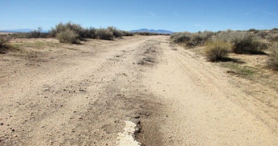 Photograph by Bob Alvis The old road and a bit of the centerline that carried the workforce in the early day’s of Muroc /Edwards.