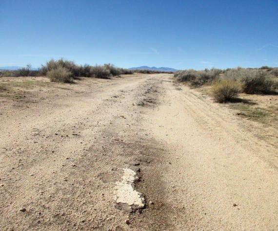 Photograph by Bob Alvis The old road and a bit of the centerline that carried the workforce in the early day’s of Muroc /Edwards.
