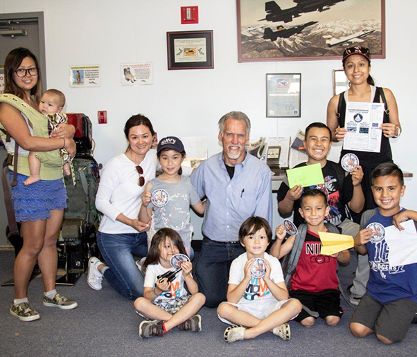 Photograph by Linda KC Reynolds Art Thompson of Sage Cheshire poses with kids and parents after a stealth technology session during the Jr. Test Pilot School summer program at Blackbird Airpark Museum in Palmdale, Calif. The free, two-week program is designed for elementary students, however all ages are welcome.