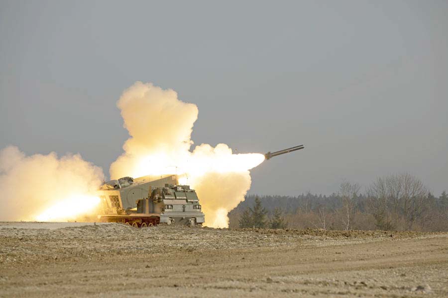 Soldiers fire from a multiple launch rocket system during a live-fire certification at Grafenwoehr Training Area, Germany, Feb. 24, 2021. Army photograph by Maj. Joseph Bush