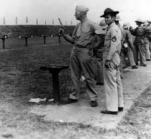 Pvt. Paul Douglas, age 50, preforms pistol qualification aboard Marine Corps Recruit Depot S.C