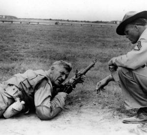 Pvt. Paul Douglas, age 50, preforms rifle qualification aboard Marine Corps Recruit Depot S.C.