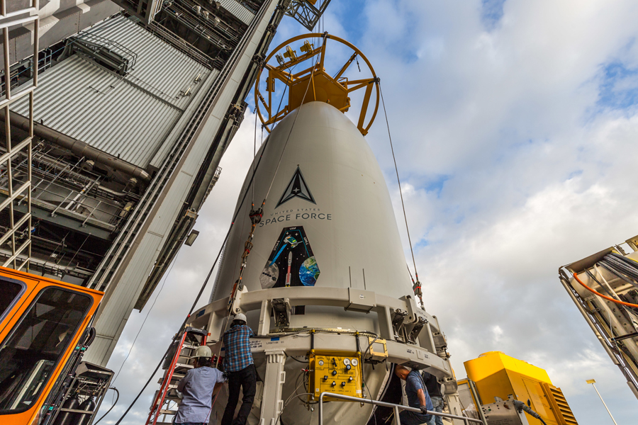 Workers with United Launch Alliance prepare the Space Test Program-3 mission for the U.S. Space Force's Space Systems Command