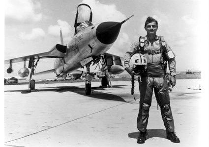 Robert Cardenas is pictured standing by an F-105 in Southeast Asia. Courtesy photograph