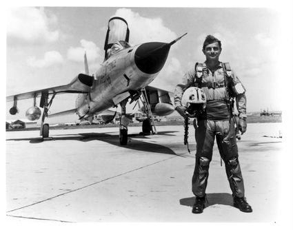 Robert Cardenas is pictured standing by an F-105 in Southeast Asia. Courtesy photograph