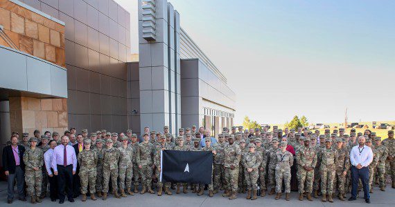 Space Flag 22-3 participants pose for a group photo at Schriever Space Force Base, Colo., Aug. 8, 2022. Space Flag 22-3, which ran from Aug. 8-19, was the largest iteration executed to date with approximately 120 participants from nearly a dozen U.S. Space Force Deltas, as well as members from the U.S. Air Force and the U.S. Army.
