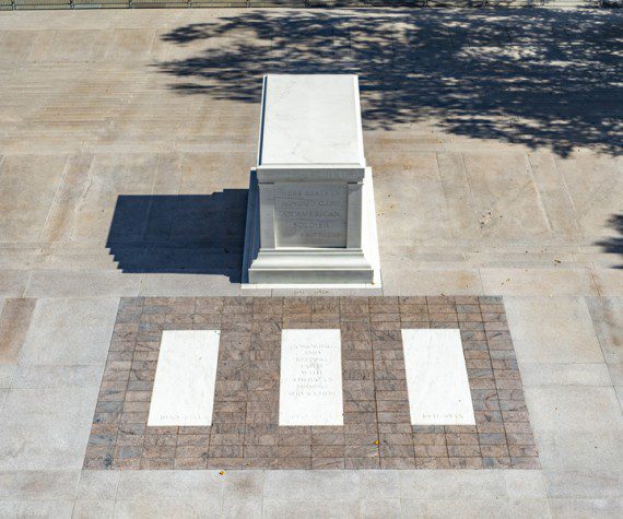 There are actually four crypts. Three unknown American service members lie in separate crypts on the east plaza of the Memorial Amphitheater.
