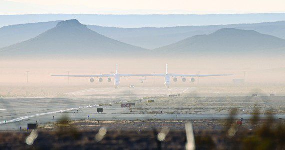 Stratolaunch’s Roc aircraft readies for takeoff at the Mojave Air and Space Port, Oct. 28, 2022. This was the aircraft’s eighth test flight, and first captive-carry flight with the Talon A mockup attached. (Photograph by Issei Kobayashi)