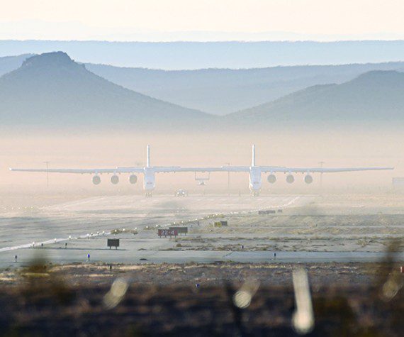 Stratolaunch’s Roc aircraft readies for takeoff at the Mojave Air and Space Port, Oct. 28, 2022. This was the aircraft’s eighth test flight, and first captive-carry flight with the Talon A mockup attached. (Photograph by Issei Kobayashi)